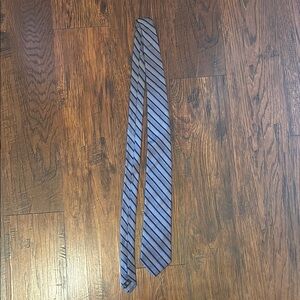 Calvin Klein Blue Tie with Diagonal Striped Pattern and Classic Shape